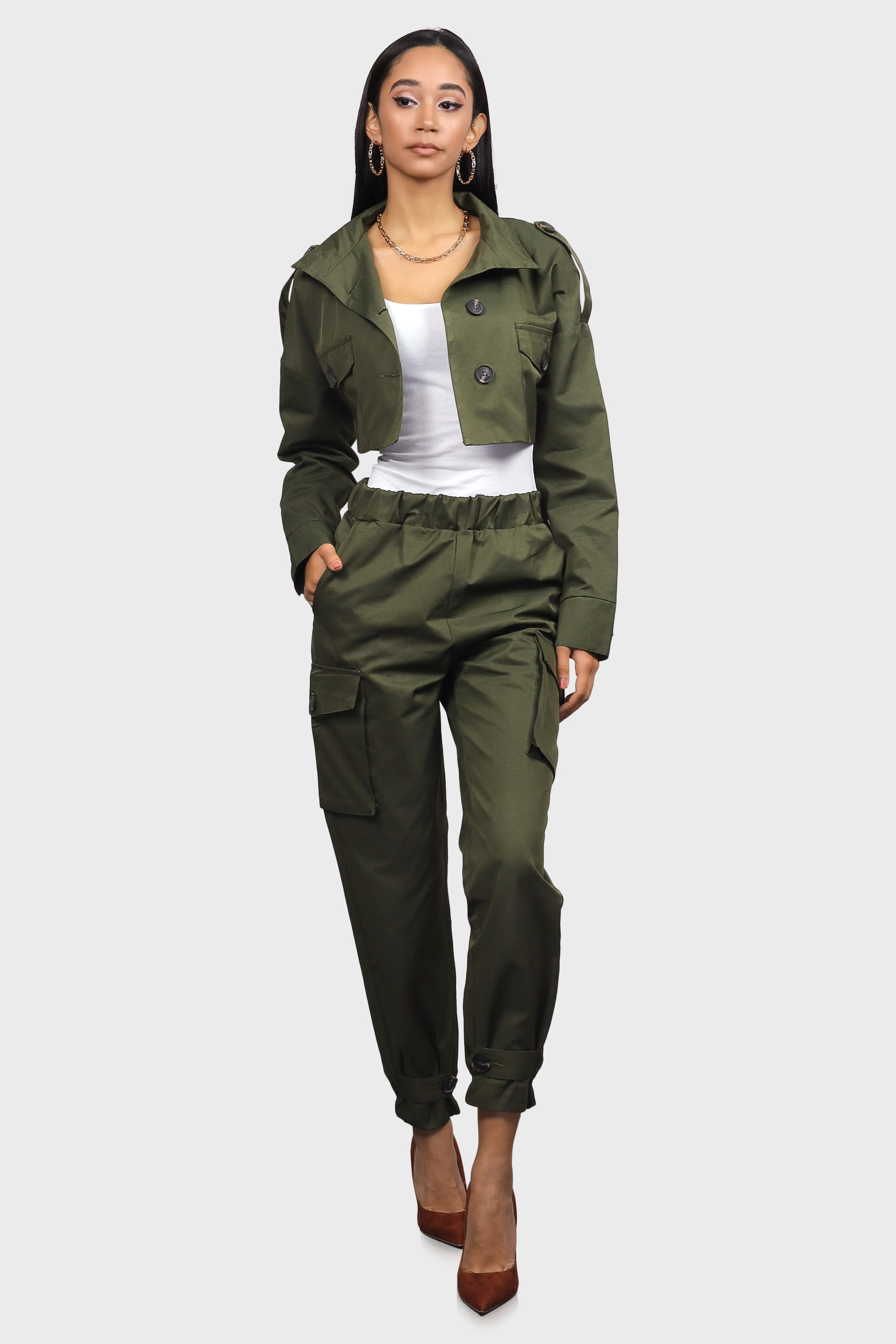 Utility jacket and joggers with snakeskin boots